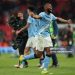 Manchester City's Ghanaian midfielder #42 Antoine Semenyo  celebrates after the English League Cup final football match between Arsenal and Manchester City at Wembley Stadium in London on March 22, 2026. City won the game 2-0. (Photo by Adrian Dennis / AFP via Getty Images)