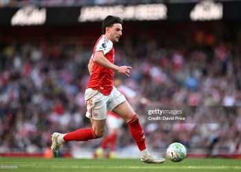 Declan Rice of Arsenal runs with the ball during the Premier League match between Arsenal and Newcastle United (Photo by David Price/Arsenal FC via Getty Images)