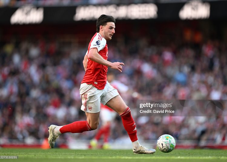 Declan Rice of Arsenal runs with the ball during the Premier League match between Arsenal and Newcastle United (Photo by David Price/Arsenal FC via Getty Images)