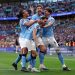 Nico Gonzalez of Manchester City celebrates scoring his team's second goal with teammates Nathan Ake, Bernardo Silva and John Stones during the Emirates FA Cup Semi Final match between Manchester City and Southampton (Photo by Justin Setterfield/Getty Images)