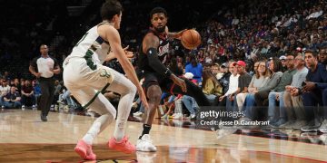 Paul George #8 of the Philadelphia 76ers dribbles the ball during the game against the Milwaukee Bucks (Photo by Jesse D. Garrabrant/NBAE via Getty Images)