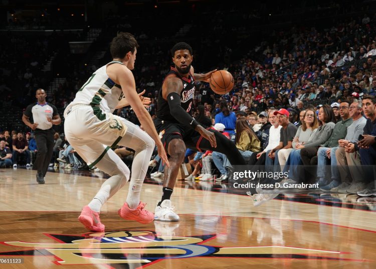 Paul George #8 of the Philadelphia 76ers dribbles the ball during the game against the Milwaukee Bucks (Photo by Jesse D. Garrabrant/NBAE via Getty Images)
