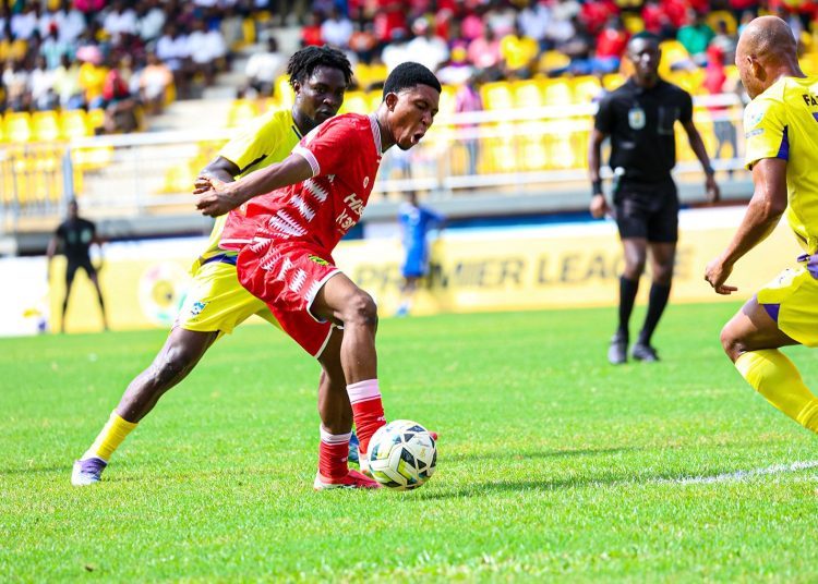 Kotoko's Lawrence Kyie Manu (with ball) in action against Medeama Photo Courtesy: AKSC