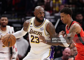 Jabari Smith Jr. #10 of the Houston Rockets defends LeBron James #23 of the Los Angeles Lakers during the second quarteri in Game Four of the First Round of the NBA Western Conference Playoffs (Photo by Tim Warner/Getty Images)