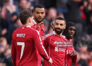 LIVERPOOL, ENGLAND - APRIL 11: Mohamed Salah of Liverpool celebrates scoring his team's second goal with teammates Cody Gakpo and Jeremie Frimpong during the Premier League match between Liverpool and Fulham at Anfield on April 11, 2026 in Liverpool, England. (Photo by Carl Recine/Getty Images)