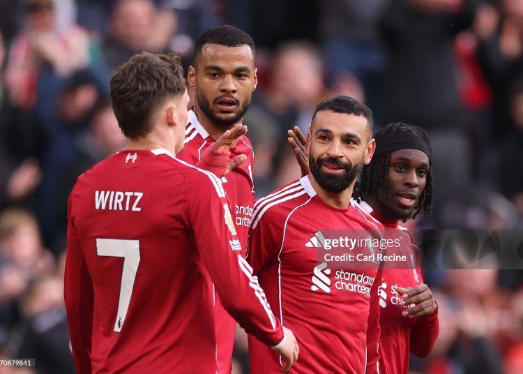 LIVERPOOL, ENGLAND - APRIL 11: Mohamed Salah of Liverpool celebrates scoring his team's second goal with teammates Cody Gakpo and Jeremie Frimpong during the Premier League match between Liverpool and Fulham at Anfield on April 11, 2026 in Liverpool, England. (Photo by Carl Recine/Getty Images)