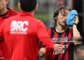 AC Milan's Croatian midfielder #14 Luka Modric leaves the pitch after being injured during the Italian Serie A football match between AC Milan and Juventus FC  (Photo by Stefano RELLANDINI / AFP via Getty Images)