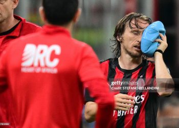 AC Milan's Croatian midfielder #14 Luka Modric leaves the pitch after being injured during the Italian Serie A football match between AC Milan and Juventus FC  (Photo by Stefano RELLANDINI / AFP via Getty Images)