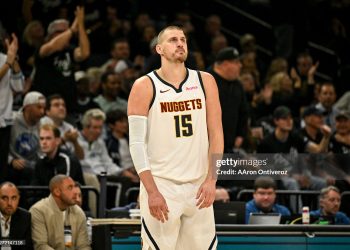 Nikola Jokic (15) of the Denver Nuggets stands on the court befuddled as the Minnesota Timberwolves do everything to take the advantage during the second quarter (Photo by AAron Ontiveroz/The Denver Post)