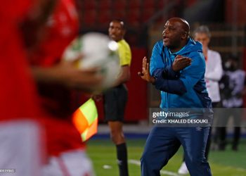 Pitso Mosimane reacts during the CAF Champions League semi-final match between Egypt's al-Ahly and Algeria's ES Setif (Photo by KHALED DESOUKI/AFP via Getty Images)