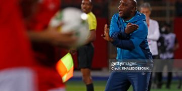 Pitso Mosimane reacts during the CAF Champions League semi-final match between Egypt's al-Ahly and Algeria's ES Setif (Photo by KHALED DESOUKI/AFP via Getty Images)