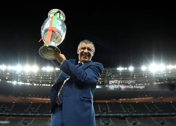 Fernando Santos manager of Portugal lifts the Henri Delaunay trophy to celebrate after his team's 1-0 win against France in the UEFA EURO 2016 Final match (Photo by Matthias Hangst/Getty Images)