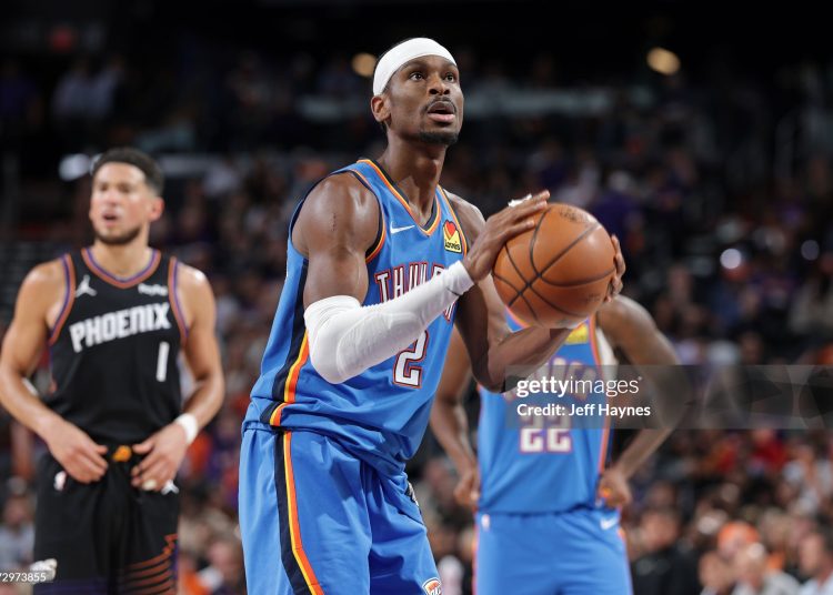 Shai Gilgeous-Alexander #2 of the Oklahoma City Thunder shoots a free throw during the game against the Phoenix Suns during Round One Game Four (Photo by Jeff Haynes/NBAE via Getty Images)