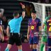 Referee Istvan Kovacs shows a red card to Pau Cubarsi of FC Barcelona following a VAR review after a challenge on Giuliano Simeone of Atletico de Madrid (not pictured) during the UEFA Champions League 2025/26 Quarter-Final First Leg match between FC Barcelona and Club Atlético de Madrid (Photo by Alex Caparros - UEFA/UEFA via Getty Images)