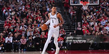 Victor Wembanyama #1 of the San Antonio Spurs dribbles the ball during the game against the Portland Trail Blazers during Round 1 Game 4 (Photo by Brian Babineau/NBAE via Getty Images)