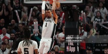 Victor Wembanyama #1 of the San Antonio Spurs dunks during the second half of Game Four of the Western Conference First Round Playoffs against the Portland Trail Blazers (Photo by Soobum Im/Getty Images)