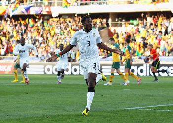 Asamoah Gyan of Ghana celebrates scoring a penalty during the 2010 FIFA World Cup South Africa Group D match between Ghana and Australia at the Royal Bafokeng Stadium on June 19, 2010 in Rustenburg, South Africa. Photo by Robert Cianflone/Getty Images