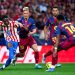 Taufik Seidu of Atletico de Madrid battle for the ball with Dani Olmo of FC Barcelona. Photo by Diego Souto/Getty Images