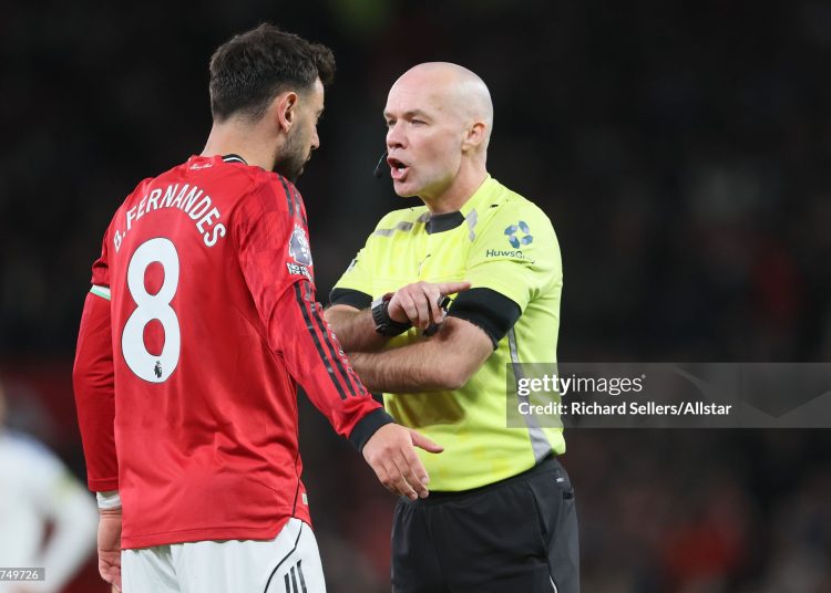 Bruno Fernandes of Manchester United is spoken to by referee Paul Tierney during the Premier League match between Manchester United and Leeds United (Photo by Richard Sellers/Sportsphoto/Allstar via Getty Images)