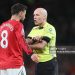 Bruno Fernandes of Manchester United is spoken to by referee Paul Tierney during the Premier League match between Manchester United and Leeds United (Photo by Richard Sellers/Sportsphoto/Allstar via Getty Images)