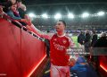 Gabriel Martinelli of Arsenal interacts with the fans as he leaves the field following the team's victory in the UEFA Champions League 2025/26 Quarter-Final Second Leg match between Arsenal FC and Sporting Clube de Portugal (Photo by Stuart MacFarlane/Arsenal FC via Getty Images)