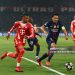 Michael Olise of Bayern Munich competes with Marquinhos of Paris Saint-Germain during the UEFA Champions League 2025/26 Semi Final First Leg match between Paris Saint-Germain and Bayern Munich (Photo by Chris Brunskill/Fantasista/Getty Images)