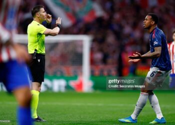 Referee Danny Makkelie argues with Gabriel of Arsenal during the UEFA Champions League  match between Atletico Madrid v Arsenal (Photo by Maria Gracia Jimenez/Soccrates/Getty Images)