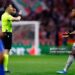 Referee Danny Makkelie argues with Gabriel of Arsenal during the UEFA Champions League  match between Atletico Madrid v Arsenal (Photo by Maria Gracia Jimenez/Soccrates/Getty Images)