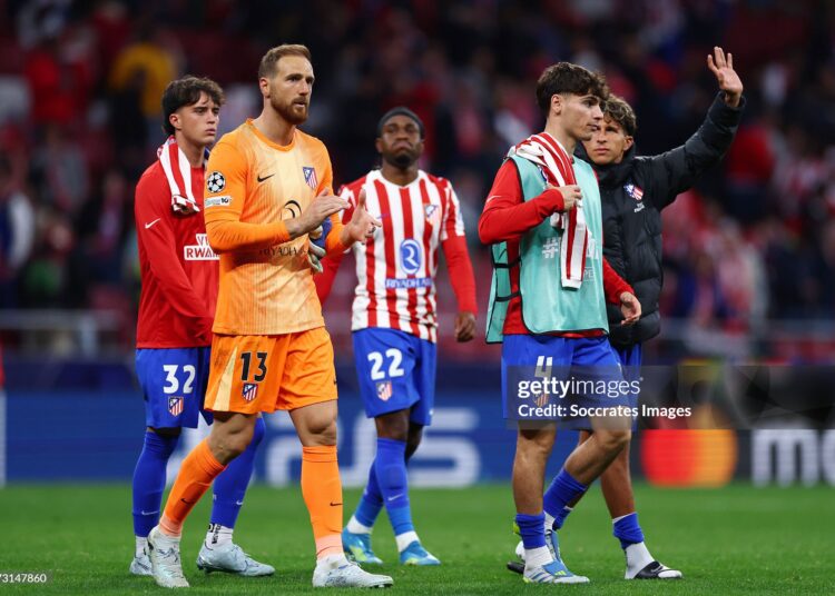 (L-R) Javier Bonar of Atletico Madrid, Jan Oblak of Atletico Madrid, Rodrigo Mendoza of Atletico Madrid after the match  during the UEFA Champions League  match between Atletico Madrid v Arsenal (Photo by Maria Gracia Jimenez/Soccrates/Getty Images)