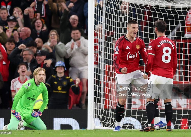 Benjamin Sesko of Manchester United celebrates scoring his team's second goal with teammate Bruno Fernandes during the Premier League match between Manchester United and Brentford (Photo by Alex Livesey/Getty Images)