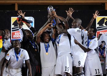 Ghana captain Andre Ayew holds up the trophy with team-mates during the FIFA U20 World Final match between Ghana and Brazil at the Cairo International Stadium  on October 16, 2009 in Cairo, Egypt. Photo by Shaun Botterill -FIFA/FIFA via Getty Images