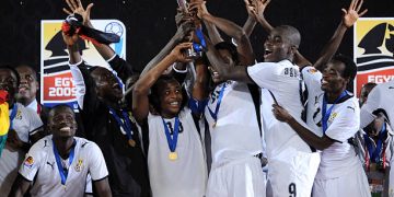 Ghana captain Andre Ayew holds up the trophy with team-mates during the FIFA U20 World Final match between Ghana and Brazil at the Cairo International Stadium  on October 16, 2009 in Cairo, Egypt. Photo by Shaun Botterill -FIFA/FIFA via Getty Images