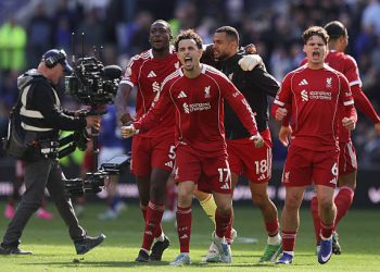 Players of Liverpool celebrate after the Premier League match between Everton and Liverpool at Hill Dickinson Stadium on April 19, 2026 in Liverpool, England. (Photo by James Gill - Danehouse/Getty Images)