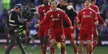 Players of Liverpool celebrate after the Premier League match between Everton and Liverpool at Hill Dickinson Stadium on April 19, 2026 in Liverpool, England. (Photo by James Gill - Danehouse/Getty Images)