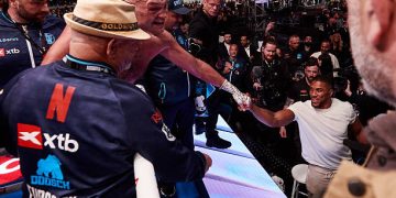 Tyson Fury exchanges words with Anthony Joshua after his fight at Tottenham Hotspur Stadium on April 11, 2026 in London, England. (Photo by Mark Robinson/Getty Images)