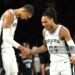Victor Wembanyama #1  and Devin Vassell #24 of the San Antonio Spurs celebrate during the second quarter of a game against the Minnesota Timberwolves in Game Six of the Second Round of the NBA Western Conference Playoffs (Photo by David Berding/Getty Images)