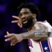 Philadelphia 76ers center Joel Embiid reacts after making a 3-pointer in the second quarter. The Boston Celtics played the Philadelphia 76ers in the first round of the NBA Playoffs (Photo by Danielle Parhizkaran/The Boston Globe via Getty Images)
