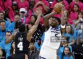 Anthony Edwards #5 of the Minnesota Timberwolves shoots the ball against De'aaron Fox #4 of the San Antonio Spurs during the first half of a game in Game One of the Second Round of the NBA Western Conference Playoffs at Frost Bank Center (Photo by Ronald Cortes/Getty Images)