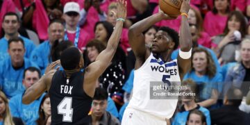 Anthony Edwards #5 of the Minnesota Timberwolves shoots the ball against De'aaron Fox #4 of the San Antonio Spurs during the first half of a game in Game One of the Second Round of the NBA Western Conference Playoffs at Frost Bank Center (Photo by Ronald Cortes/Getty Images)