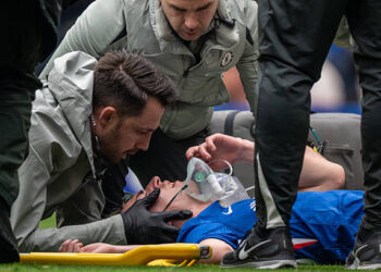 Jesse Derry of Chelsea receives medical treatment during the Premier League match between Chelsea and Nottingham Forest at Stamford Bridge on May 4, 2026 in London, England. (Photo by Sebastian Frej/MB Media/Getty Images)