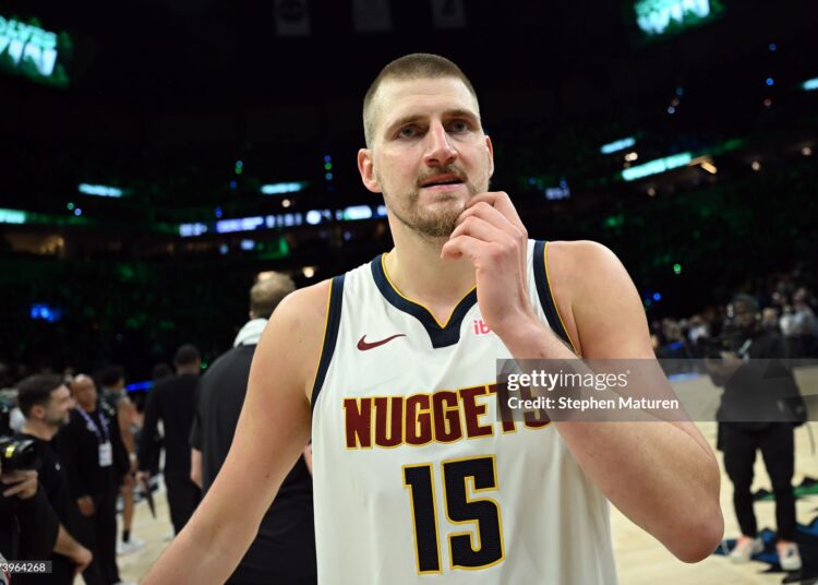 Nikola Jokic #15 of the Denver Nuggets walks off the court after being defeated by the Minnesota Timberwolves 110-98 in Game Six of the First Round of the NBA Western Conference Playoffs (Photo by Stephen Maturen/Getty Images)