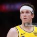 Austin Reaves #15 of the Los Angeles Lakers looks on against the Houston Rockets during the fourth quarter in Game Six of the First Round of the NBA Western Conference Playoffs (Photo by Kenneth Richmond/Getty Images)
