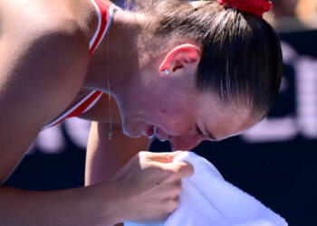 Ukraine's Marta Kostyuk cries. (Photo by YUICHI YAMAZAKI/AFP via Getty Images)