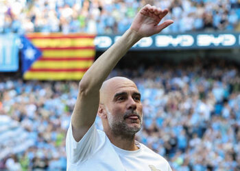 Manchester City's Spanish manager Pep Guardiola waves at the start of the English Premier League football match between Manchester City and Aston Villa at the Etihad Stadium in Manchester, north west England, on May 24, 2026. (Photo by Darren Staples / AFP via Getty Images) / RESTRICTED TO EDITORIAL USE. No use with unauthorized audio, video, data, fixture lists, club/league logos or 'live' services. Online in-match use limited to 120 images. An additional 40 images may be used in extra time. No video emulation. Social media in-match use limited to 120 images. An additional 40 images may be used in extra time. No use in betting publications, games or single club/league/player publications. /
