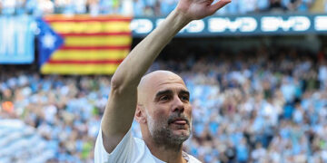 Manchester City's Spanish manager Pep Guardiola waves at the start of the English Premier League football match between Manchester City and Aston Villa at the Etihad Stadium in Manchester, north west England, on May 24, 2026. (Photo by Darren Staples / AFP via Getty Images) / RESTRICTED TO EDITORIAL USE. No use with unauthorized audio, video, data, fixture lists, club/league logos or 'live' services. Online in-match use limited to 120 images. An additional 40 images may be used in extra time. No video emulation. Social media in-match use limited to 120 images. An additional 40 images may be used in extra time. No use in betting publications, games or single club/league/player publications. /
