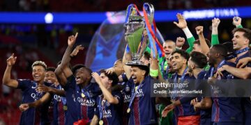 Marquinhos of Paris Saint-Germain lifts the UEFA Champions League trophy after his team's victory in the UEFA Champions League Final 2026 match between Paris Saint-Germain and Arsenal FC (Photo by Justin Setterfield/Getty Images)