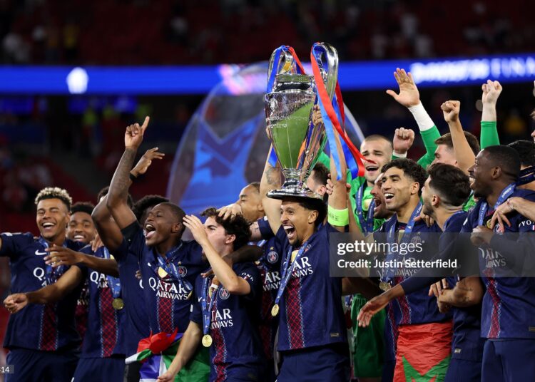 Marquinhos of Paris Saint-Germain lifts the UEFA Champions League trophy after his team's victory in the UEFA Champions League Final 2026 match between Paris Saint-Germain and Arsenal FC (Photo by Justin Setterfield/Getty Images)