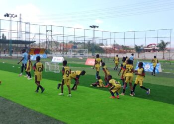 Some of the Children training under QNET and Manchester City clinic held in Ghana