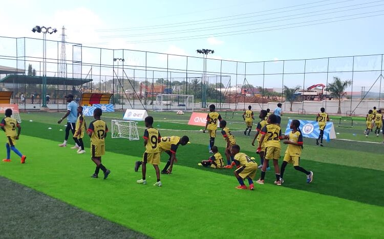 Some of the Children training under QNET and Manchester City clinic held in Ghana
