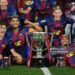 Robert Lewandowski, Gavi, Ronald Araujo, Dani Olmo, Alejandro Balde and Raphinha of FC Barcelona celebrate as they pose for a photograph with the LaLiga EA Sports trophy, after defeating Real Madrid to secure the title, during the LaLiga EA Sports match between FC Barcelona and Real Madrid CF (Photo by David Ramos/Getty Images)